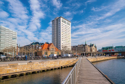 Buildings in city against sky