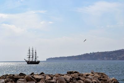 View of sailboat in sea against sky