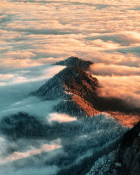 Mountain ridge rising from the fog. it was a cold morning but the sun warmed it away really soon.