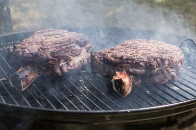 Close-up of meat on barbecue grill