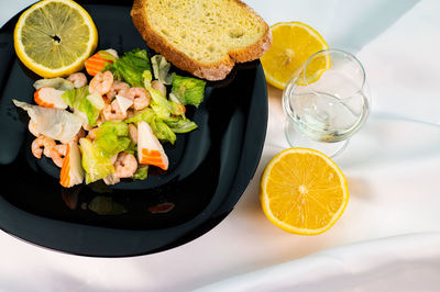 High angle view of fruits in glass on table