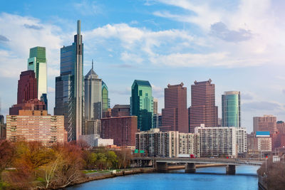 Modern buildings in city against sky