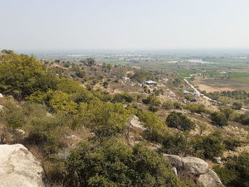 High angle view of land against clear sky