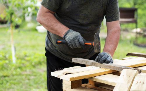 Man working on wood