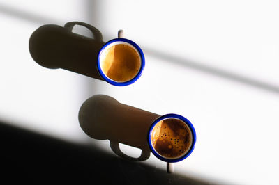 Close-up of coffee cup on table