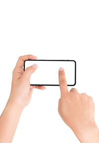 Close-up of man using mobile phone against white background