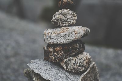 Close-up of stone stack on rock