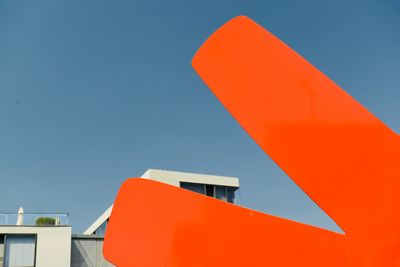 Low angle view of building against blue sky