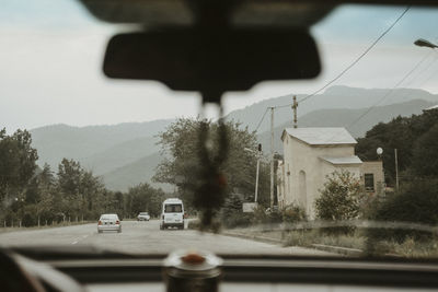 Road seen through car windshield