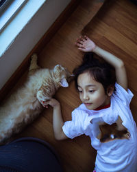 Portrait of boy playing with teddy bear