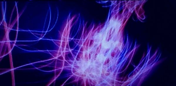 Close-up of abstract lights against black background