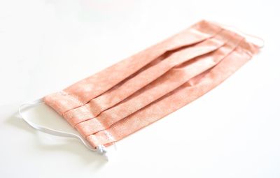 Close-up of cake against white background