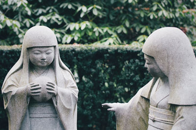 Buddha statue in cemetery