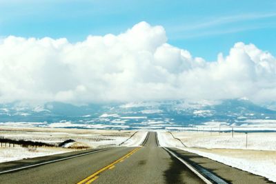 Country road passing through landscape