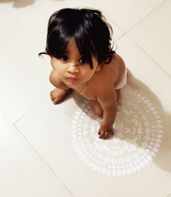 High angle view of cute baby at home