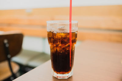 Close-up of beer glass on table