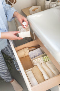 Midsection of man preparing food