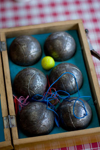 High angle view of various objects on wooden table