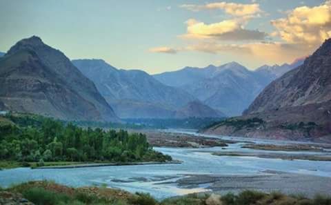 mountain, scenics, tranquil scene, water, mountain range, tranquility, beauty in nature, idyllic, sky, nature, cloud - sky, river, non-urban scene, remote, outdoors, majestic, physical geography, solitude, mountain peak, no people, shore, countryside, rocky mountains