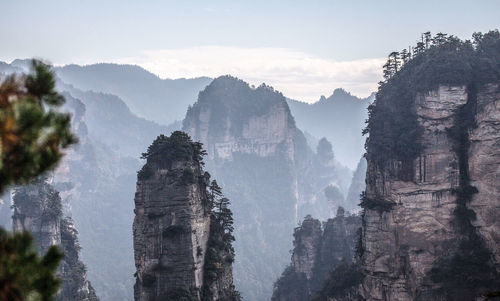 Panoramic view of rocky mountains against sky