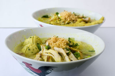 Close-up of noodles in bowl on table