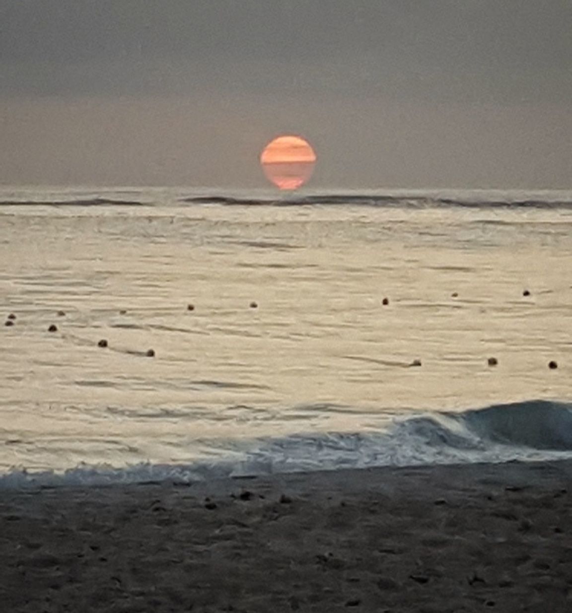 nature, sand, beauty in nature, beach, tranquil scene, sea, outdoors, scenics, tranquility, sun, no people, moon, water, landscape, day, wave, desert, travel destinations, sunset, arid climate, sky, horizon over water, astronomy