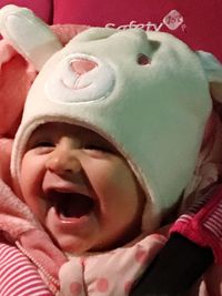 Close-up portrait of cute girl with eyes closed