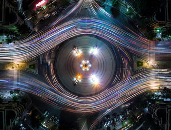 Directly above shot of light trails on multiple lane highway at night