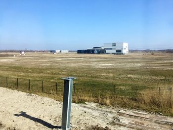 View of field against clear sky