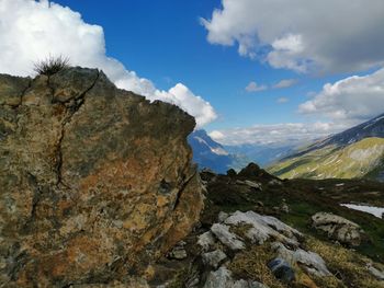 Low angle view of rock formation against sky