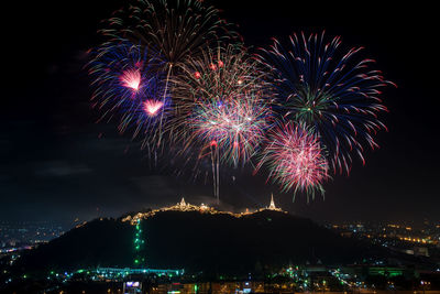 Firework display at night