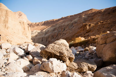 Rock formation on land against sky