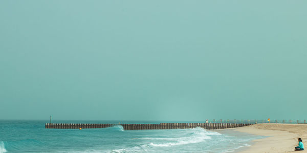 Scenic view of sea against clear sky