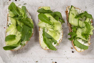 Sandwiches with vegetable ricotta and green fresh veggies