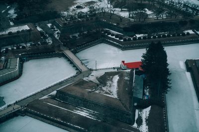 High angle view of buildings in city during winter