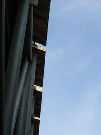 Low angle view of bridge against buildings