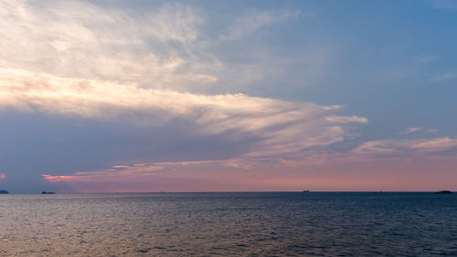 Scenic view of sea against dramatic sky