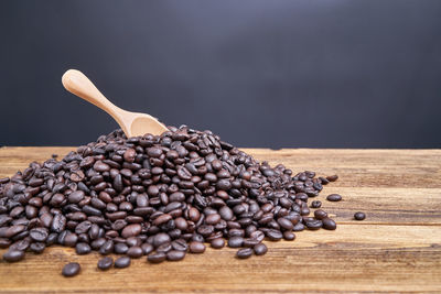 Close-up of coffee beans on table