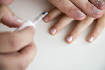 Midsection of woman holding hands