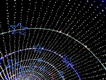 Close-up of illuminated blue lights at night