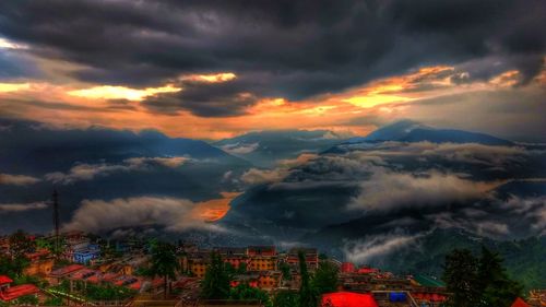 Scenic view of rainbow against sky during sunset