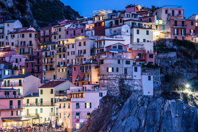 Buildings in city at night