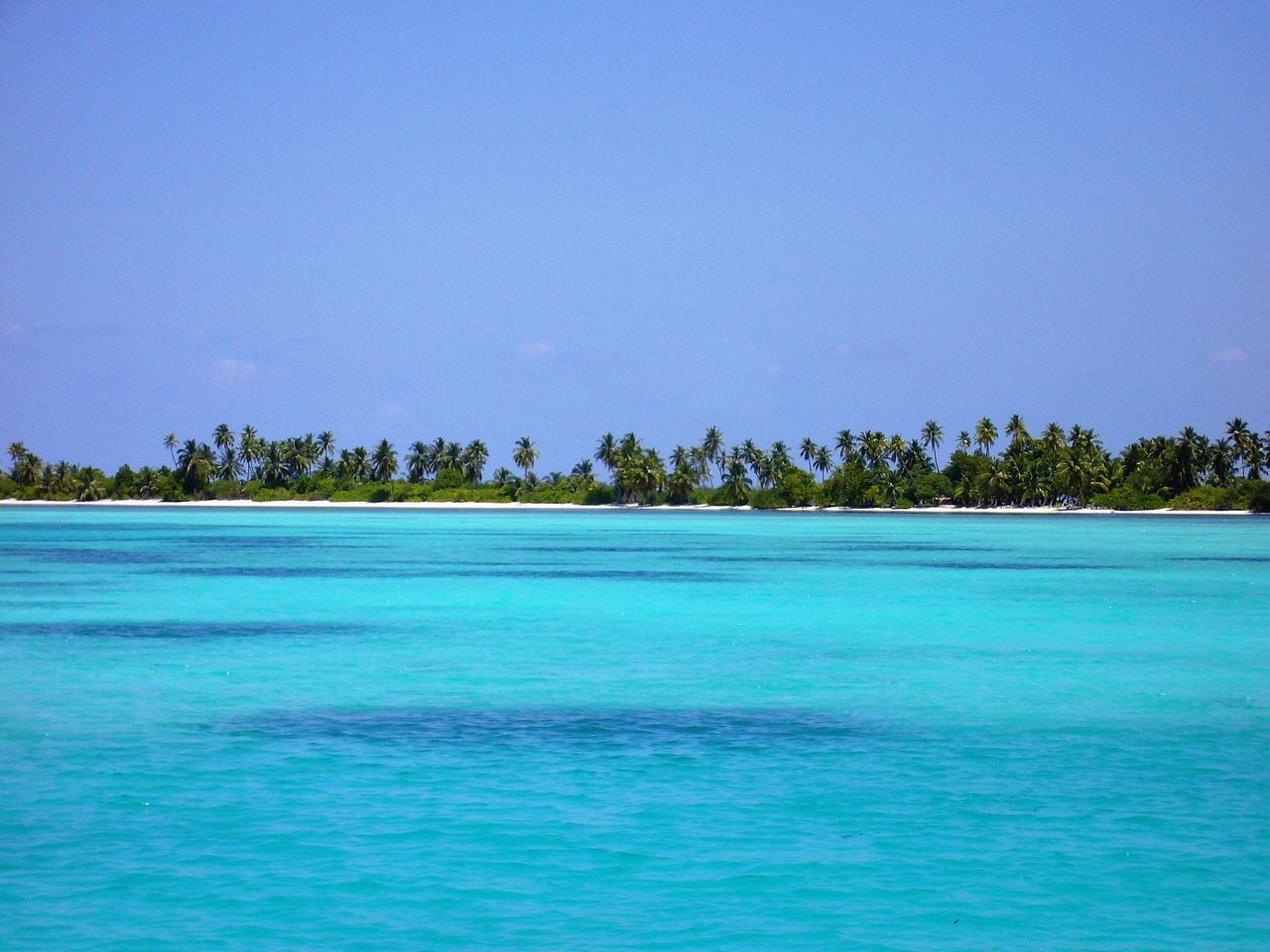 SCENIC VIEW OF SEA AGAINST BLUE SKY