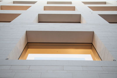 Low angle view of empty staircase against building