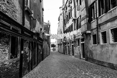 Narrow alley along buildings