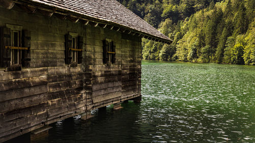 Scenic view of lake by building