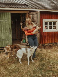 Smiling woman with dogs