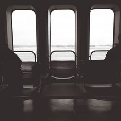 Empty chairs and window