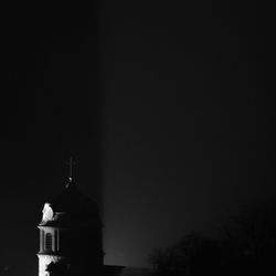 Low angle view of church against clear sky at night