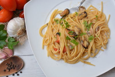 High angle view of noodles served in plate on table